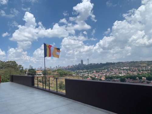 20_Buddhist flag flying over Johannesburg from the top level of te Temple